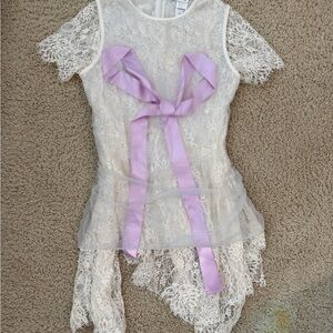 Acne Studios bow blouse with lace details runway